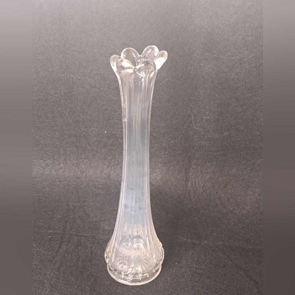 Clear glass swung vase with panels and star etched bottom
